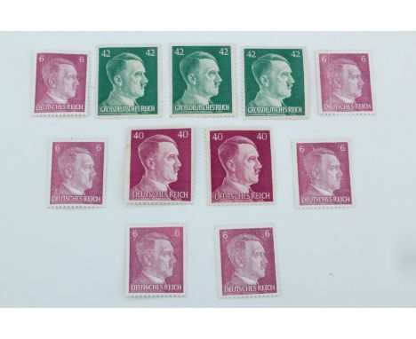 A small quantity of un-franked German Third Reich postage stamps bearing Hitler's portrait