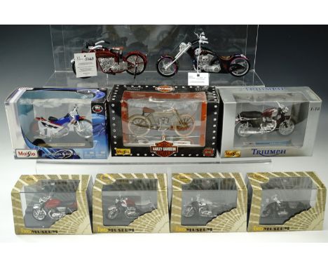 Nine boxed motorcycles including Triumph, Harley Davidson etc