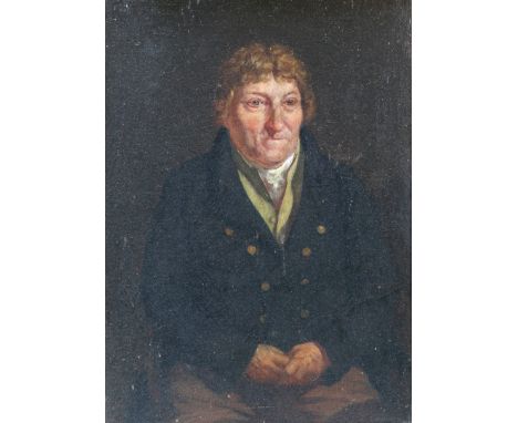 T * W * (19TH CENTURY) Portrait of a gentleman with brown curly hair and buttoned blue overcoat seated with his hands clasped
