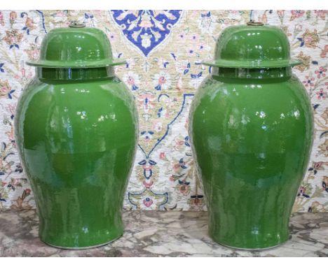 VASES, a pair, Chinese green ceramic ginger jar form with lids, 52cm H. (2)