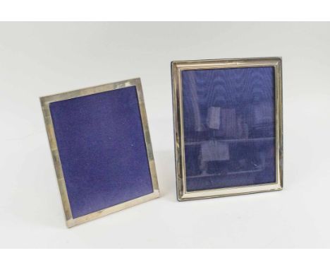 ASPREY AND GARRARD SILVER PHOTOGRAPH FRAME, 25.5cm H x 20.5cm and another 29.5cm H x 24cm maker RC. (2)