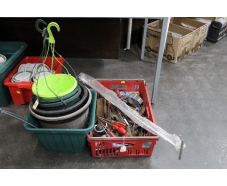 Box of tools, plant pots and hanging baskets
