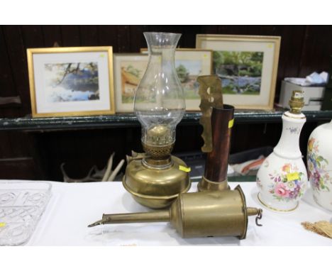 Clockwork rotisserie, vintage oil lamp and poker stand  