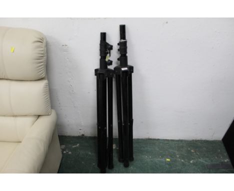 Two black metal D Glee 24/7 speaker or music stands