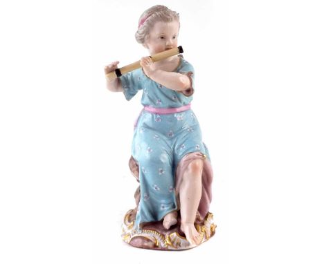 Meissen figure of a girl, modelled after J.J.Kaendler as a seated playing a flute, model number 2568, blue painted crossed sw