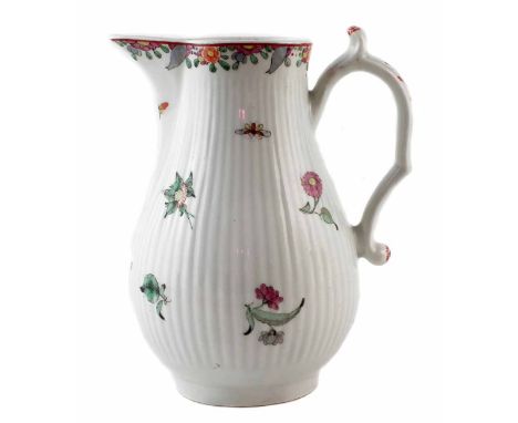 Worcester water jug circa 1760, painted with scattered famille rose flora  on a reeded body, 18cm high     
