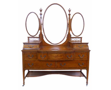 Edwardian satin wood dressing table, triple mirror with bevel support on posts with classical urn finials, base with drop-cen