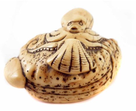 Early 19th century Japanese Edo period netsuke octopus with sea shells, height 4cm.