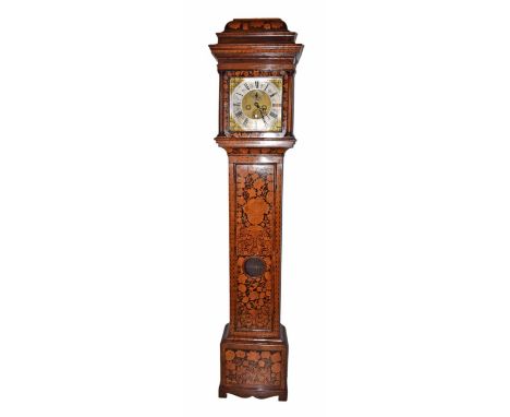 A late 17th century walnut and beech marquetry inlaid longcase clock. A stepped caddy pediment with Doric columns and long do