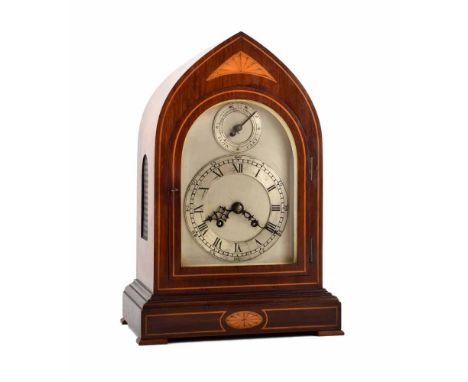 An early 20th mahogany bracket clock, with lancet arched case and inlaid patera motifs. Two train movement striking on a gong