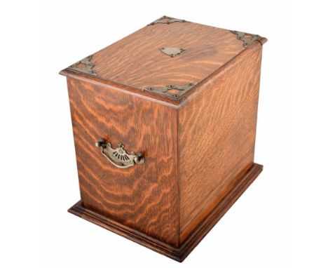 Early 20th century oak tobacco box. With steel escutcheon, handles and fretwork. The interior uses a rolling mechanism which 