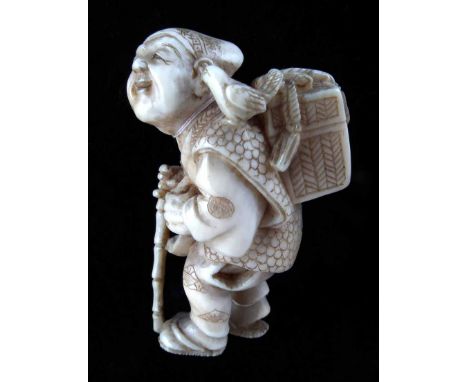 Late 19th century Japanese ivory Netsuke, boy with basket and staff, signed Masayuki, height 4.3cm.