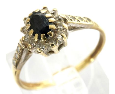 9ct gold cluster set ring with diamonds and sapphire, size K, 1.4g. P&amp;P Group 1 (£14+VAT for the first lot and £1+VAT for