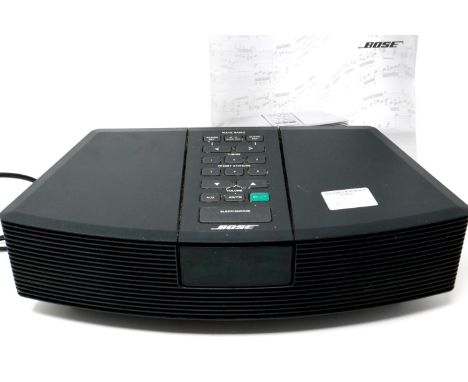 Bose Wave radio with manual, lacking remote. P&amp;P Group 2 (£18+VAT for the first lot and £3+VAT for subsequent lots)