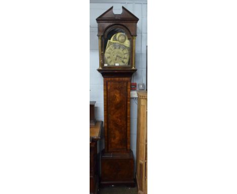 ~ A walnut veneered thirty hour longcase clock, arch brass dial bearing a later inscription Jno Charlton, Durham, later movem