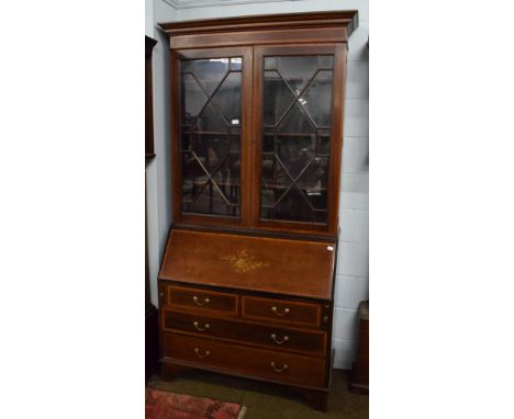 ~ A mahogany eight day longcase clock, early 19th century, arch painted dial unsignedNo weights and no pendulum.