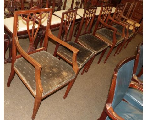A set of five mahogany chairs including three carvers, together with a pair of rush seated ladder back chairs (7)