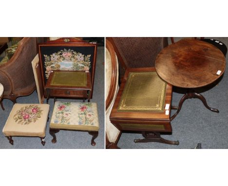 An Edwardian mahogany and parquetry decorated firescreen, inset with a needlework floral panel; an unframed needlework floral