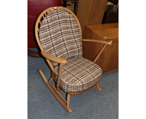 An Ercol light elm rocking chair 