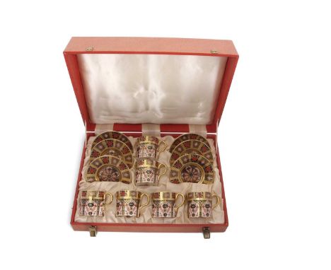 A Royal Crown Derby boxed coffee set comprising six coffee cans and saucers in original Royal Crown Derby box, all with Royal
