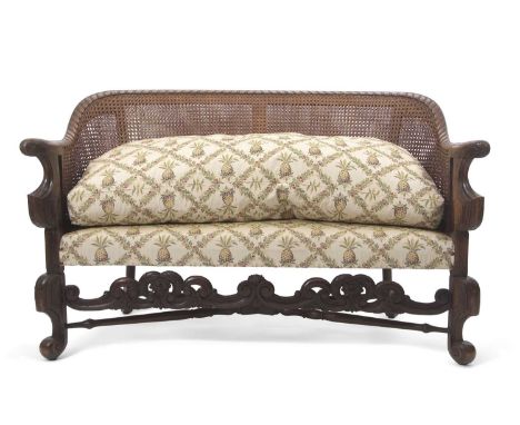 Late 19th or early 20th Century continental double caned bergere suite comprising a bow back sofa, pair of armchairs and circ