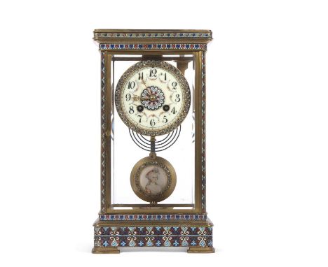 A late 19th Century French mantel clock set in a four glass, brass and coloured enamel case, the enamel dial with Arabic nume