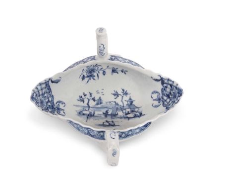 An 18th Century Worcester two handled sauce boat in blue and white with Chinoiserie designs, 18cm long