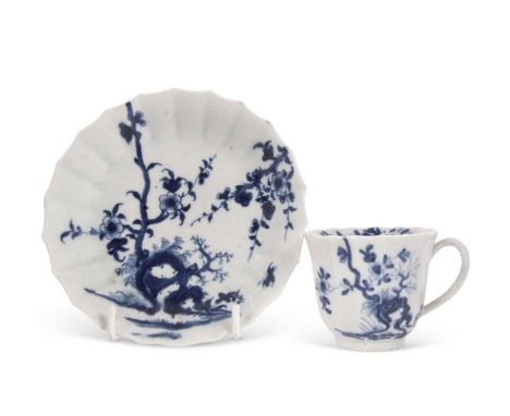 A Worcester porcelain cup and saucer in the Root pattern
