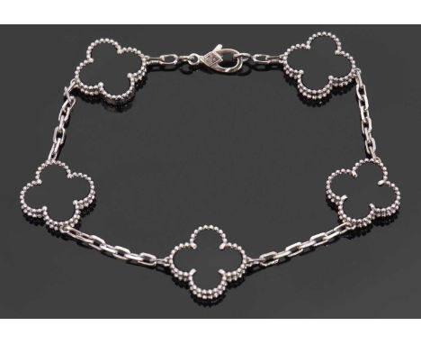 A Van Cleef &amp; Arpels Alhambra bracelet, in black onyx and 18ct white gold, serial no.JE128439, stamped VCA Au750, clasp s