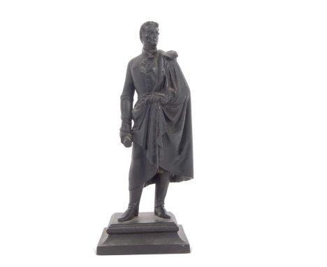 A Berlin iron ware figure of  the Duke of Wellington circa 1830, a standing figure model wrapped in a cloak, signed to the un