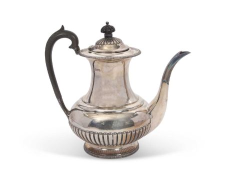 Edwardian silver coffee pot of baluster form with applied gadrooned rims, the body with a plain and part fluted design on spr