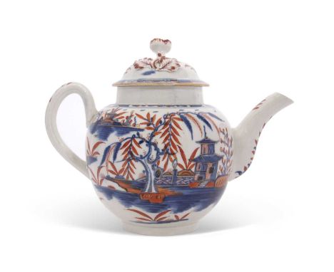 A Worcester porcelain teapot and cover, circa 1770 painted in blue with the candle fence pavilion pattern with overglaze red 