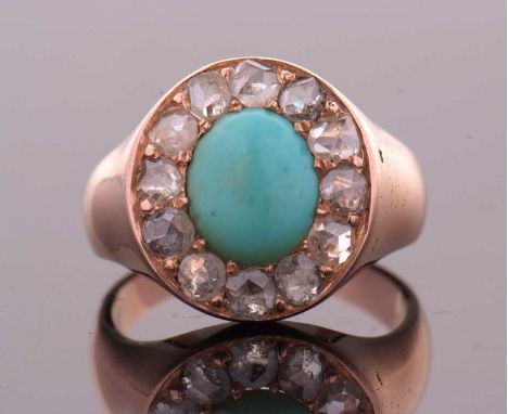 A 19th century rose gold turquoise and diamond ring, the central oval turquoise cabochon surrounded by rose cut diamonds, tot