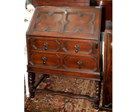 AN OAK BUREAU, 76CM W, EARLY 20TH C, AN OAK BOOK TROUGH AND A CARVED OAK CORNER CUPBOARD  