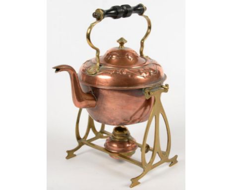 AN EDWARDIAN ART NOUVEAU COPPER AND BRASS SPIRIT KETTLE ON LAMP STAND WITH TURNED EBONISED HANDLE, 29CM H, C1905 