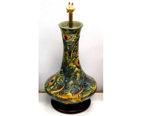 A MOORCROFT TABLE LAMP DECORATED WITH PEACOCK FEATHERS, 30CM H EXCLUDING FITMENT 