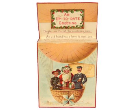 A VICTORIAN MECHANICAL ALLY SLOPER CHRISTMAS CARD BY RAPHAEL TUCK &amp; SONS   15cm h and a contemporary Victorian Santa and 