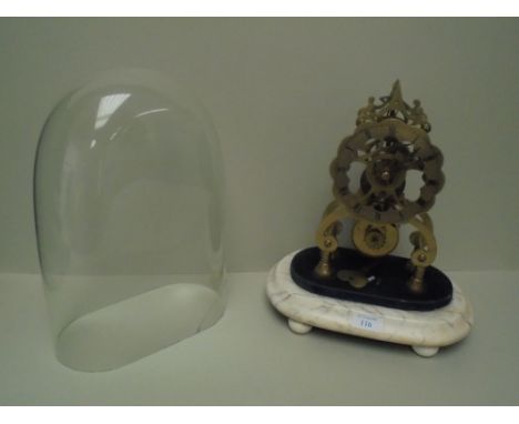 Victorian brass skeleton clock with open work single fusee movement, under glass dome. clock 24cm H(glass dome has a crack)