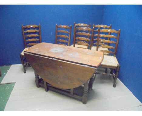 Oak gate leg table in the C18th style & 6 oak ladder back chairs with rush seats (7)