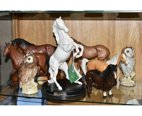 SIX ROYAL DOULTON / BESWICK HORSES / PONIES AND TWO BESWICK OWL LIQUEUR FLASKS, the horses and ponies comprising 'Spirit of T