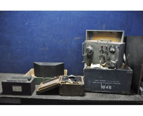 FOUR ITEMS OF VINTAGE ELECTRONIC TEST EQUIPMENT comprising of a cased Type 106 signal generator, a wall mounted speaker, a Ph
