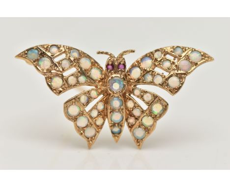 A 9CT GOLD OPAL AND RUBY BUTTERFLY BROOCH, the butterfly body and wings set with circular opal cabochons and ruby eyes, with 