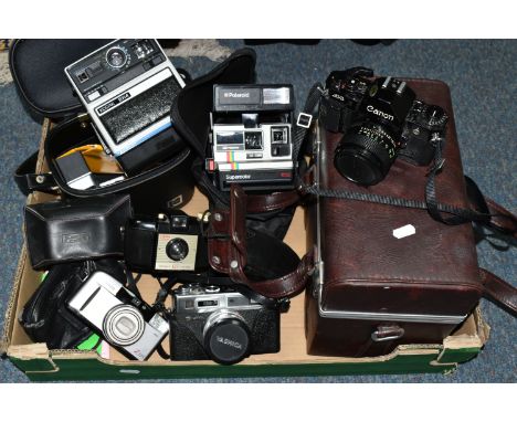 ONE BOX OF VINTAGE CAMERAS, to include a hard cased Canon A-1 1590747 camera with instruction booklet and a Canon 70-210mm zo