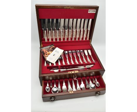 A 'BUTLER' CANTEEN, twelve person place setting of kings pattern cutlery, including meat carving knife and fork with sharpeni