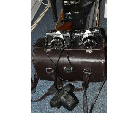 A CAMERA BAG AND A BOX OF CAMERAS AND OTHER PHOTOGRAPHIC EQUIPMENT, including an Olympus OM-1 film camera fitted with an Olym