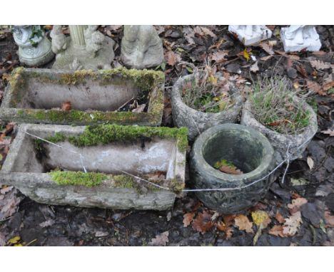 A PAIR OF WEATHERED COMPOSITE RECTANGULAR BRICK EFFECT PLANTERS, length 66cm x depth 28cm x height 26cm, a pair of circular w
