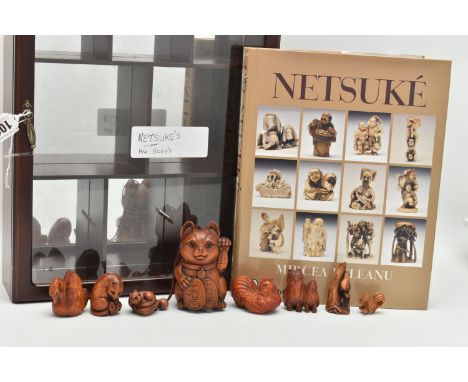 A MODERN CARVED TREEN INRO IN THE FORM OF A LUCKY CAT WITH CAT NETSUKE ATTACHED, FIVE 20TH CENTURY CARVED TREEN NETSUKE AND A