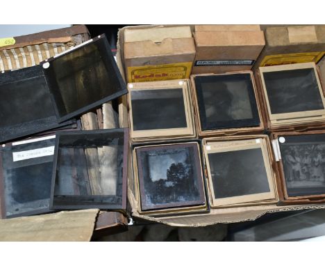 TWO BOXES OF MAGIC LANTERN SLIDES / PHOTOGRAPHIC PLATES comprising a large collection of 3.5''x 3.5'' mostly b/w examples, fr