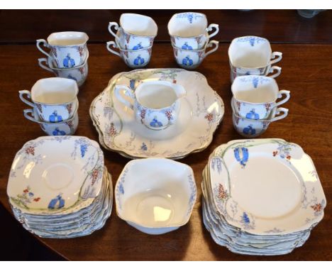 1930's period Standard China twelve person tea service decorated with a lady in a landscape   Condition: 