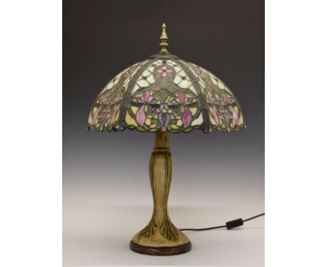 Decorative reproduction table lamp having a stained and leaded glass style shade   Condition: 